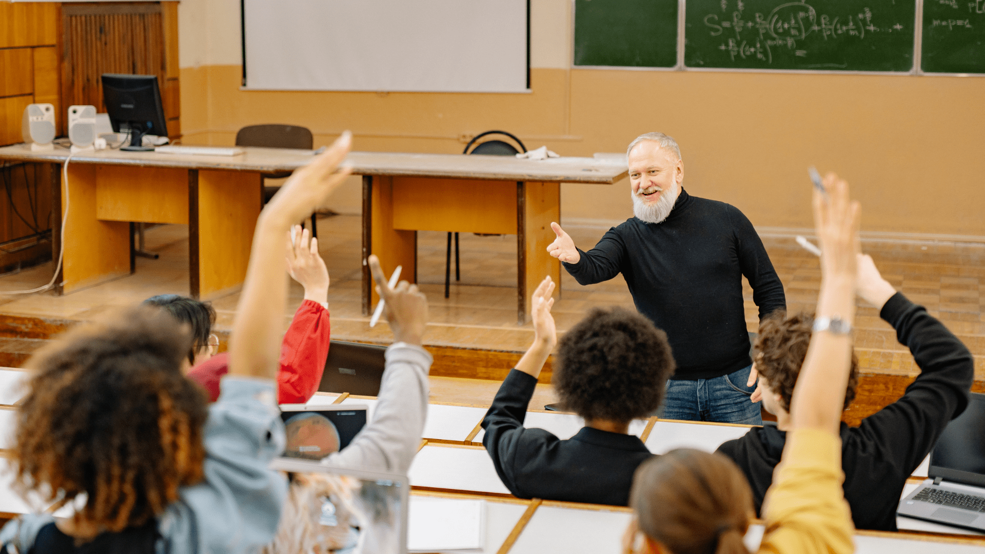 Copy-of-Website-Main-Slide1 Professor in a classroom